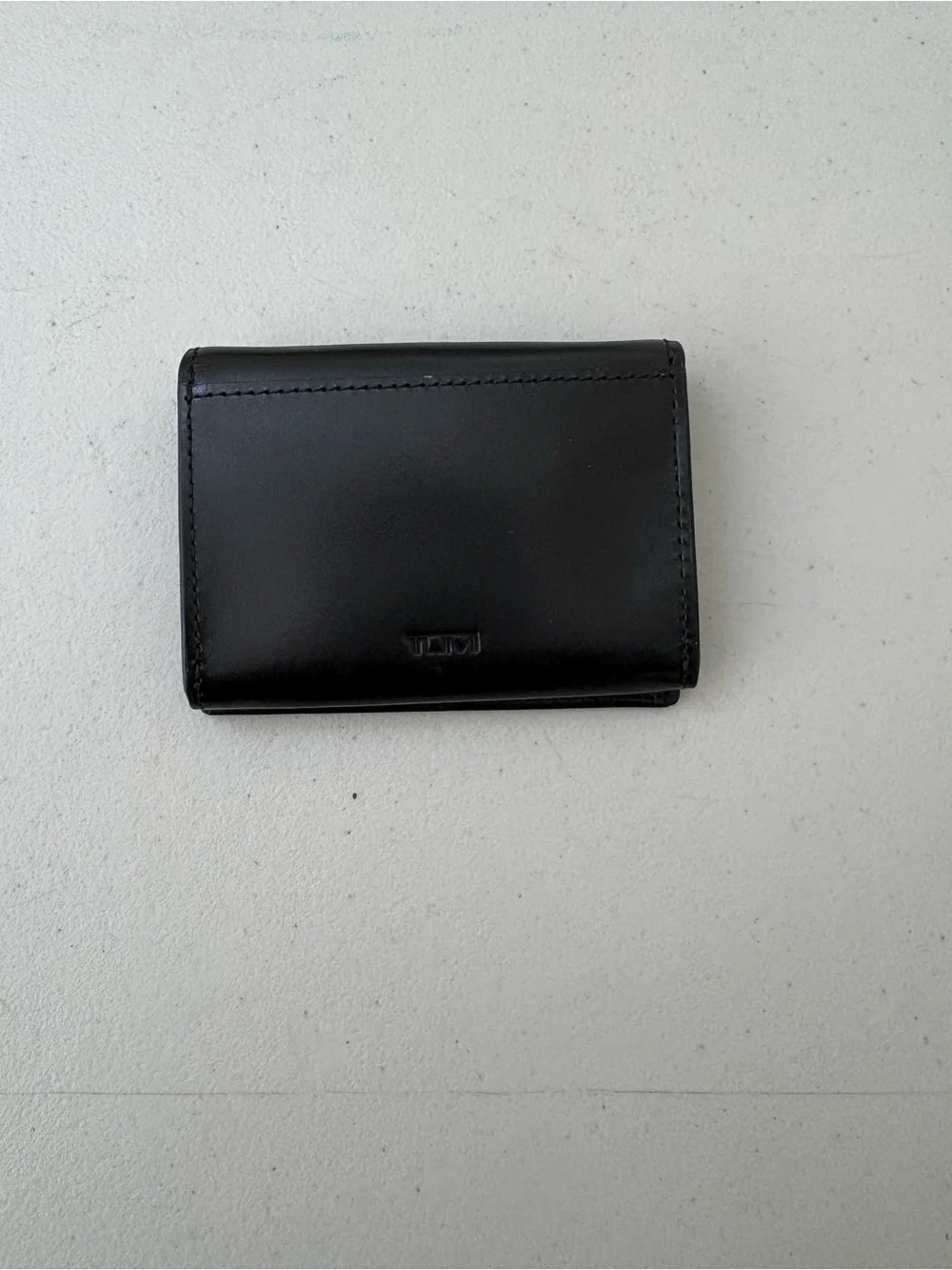 Tumi genuine leather